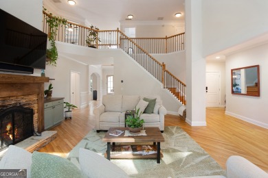 Price to move, this custom-built home sits on a roundabout on Hampton Golf Village in Georgia - for sale on GolfHomes.com, golf home, golf lot
