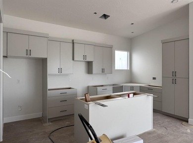 Sweeping open layout with vaulted great room and cozy fireplace on Sky Mountain Golf Course in Utah - for sale on GolfHomes.com, golf home, golf lot