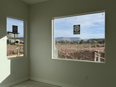 Sweeping open layout with vaulted great room and cozy fireplace on Sky Mountain Golf Course in Utah - for sale on GolfHomes.com, golf home, golf lot