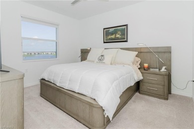 This home has the best top floor water view, together with golf on Panther Run Golf Club in Florida - for sale on GolfHomes.com, golf home, golf lot