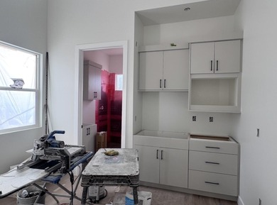 Sweeping open layout with vaulted great room and cozy fireplace on Sky Mountain Golf Course in Utah - for sale on GolfHomes.com, golf home, golf lot