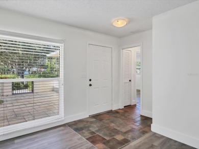 COMPLETELY UPDATED VILLA, LIGHT & BRIGHT, OPEN & AIRY TWO on Palm Aire Country Club of Sarasota in Florida - for sale on GolfHomes.com, golf home, golf lot