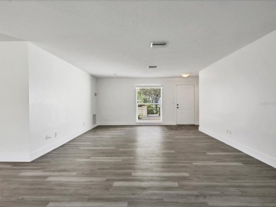 COMPLETELY UPDATED VILLA, LIGHT & BRIGHT, OPEN & AIRY TWO on Palm Aire Country Club of Sarasota in Florida - for sale on GolfHomes.com, golf home, golf lot