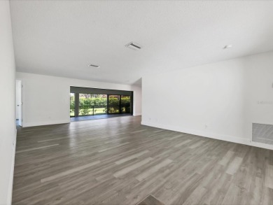 COMPLETELY UPDATED VILLA, LIGHT & BRIGHT, OPEN & AIRY TWO on Palm Aire Country Club of Sarasota in Florida - for sale on GolfHomes.com, golf home, golf lot