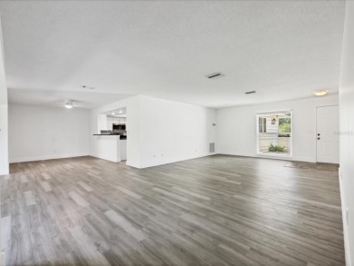 COMPLETELY UPDATED VILLA, LIGHT & BRIGHT, OPEN & AIRY TWO on Palm Aire Country Club of Sarasota in Florida - for sale on GolfHomes.com, golf home, golf lot
