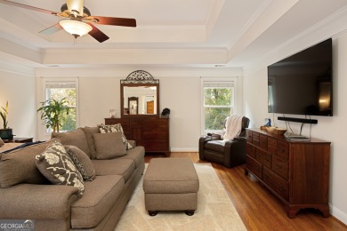Price to move, this custom-built home sits on a roundabout on Hampton Golf Village in Georgia - for sale on GolfHomes.com, golf home, golf lot