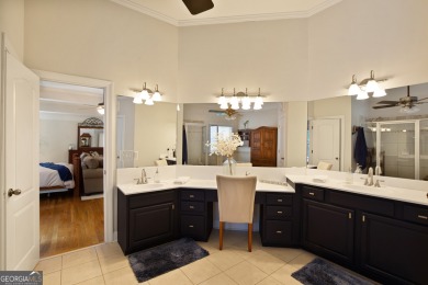 Price to move, this custom-built home sits on a roundabout on Hampton Golf Village in Georgia - for sale on GolfHomes.com, golf home, golf lot