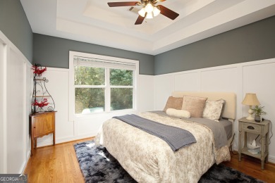 Price to move, this custom-built home sits on a roundabout on Hampton Golf Village in Georgia - for sale on GolfHomes.com, golf home, golf lot