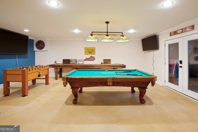 Price to move, this custom-built home sits on a roundabout on Hampton Golf Village in Georgia - for sale on GolfHomes.com, golf home, golf lot