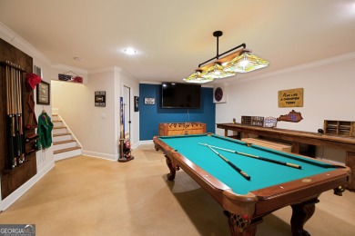 Price to move, this custom-built home sits on a roundabout on Hampton Golf Village in Georgia - for sale on GolfHomes.com, golf home, golf lot