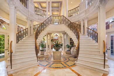 Set within the prestigious, double-gated enclave of Addison on  in Florida - for sale on GolfHomes.com, golf home, golf lot