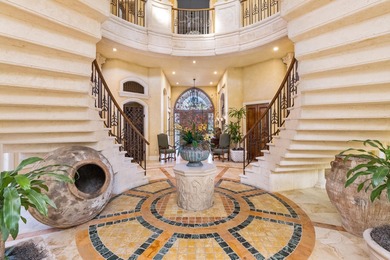 Set within the prestigious, double-gated enclave of Addison on  in Florida - for sale on GolfHomes.com, golf home, golf lot