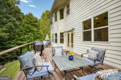 Price to move, this custom-built home sits on a roundabout on Hampton Golf Village in Georgia - for sale on GolfHomes.com, golf home, golf lot