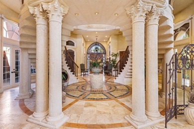 Set within the prestigious, double-gated enclave of Addison on  in Florida - for sale on GolfHomes.com, golf home, golf lot
