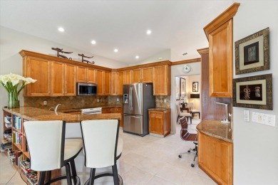 This stunning 3-bedroom 3-bathroom home offers breathtaking long on Westchester Golf and Country Club in Florida - for sale on GolfHomes.com, golf home, golf lot