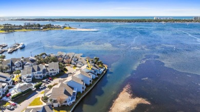 WATERFRONT, First floor, all one level.    Fabulous sunset views on Bay Point Resort Golf Club in Florida - for sale on GolfHomes.com, golf home, golf lot