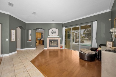 Experience timeless elegance and refined living in this stunning on Lake Jovita Golf and Country Club in Florida - for sale on GolfHomes.com, golf home, golf lot