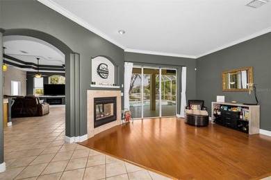 Experience timeless elegance and refined living in this stunning on Lake Jovita Golf and Country Club in Florida - for sale on GolfHomes.com, golf home, golf lot