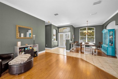 Experience timeless elegance and refined living in this stunning on Lake Jovita Golf and Country Club in Florida - for sale on GolfHomes.com, golf home, golf lot