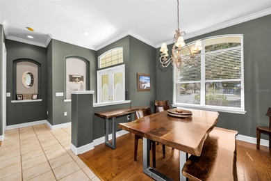 Experience timeless elegance and refined living in this stunning on Lake Jovita Golf and Country Club in Florida - for sale on GolfHomes.com, golf home, golf lot