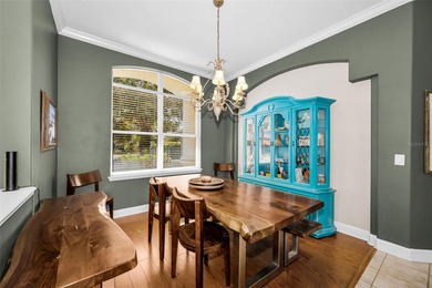 Experience timeless elegance and refined living in this stunning on Lake Jovita Golf and Country Club in Florida - for sale on GolfHomes.com, golf home, golf lot