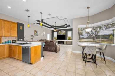 Experience timeless elegance and refined living in this stunning on Lake Jovita Golf and Country Club in Florida - for sale on GolfHomes.com, golf home, golf lot