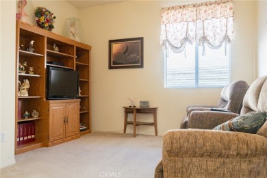 Welcome to your new sanctuary in Menifee Lakes! This beautifully on Menifee Lakes Country Club - Lakes in California - for sale on GolfHomes.com, golf home, golf lot