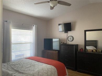 Outstanding one-story home with a screened porch and a beautiful on Plantation Golf Club in Florida - for sale on GolfHomes.com, golf home, golf lot