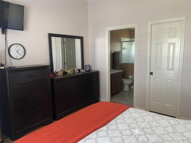 Outstanding one-story home with a screened porch and a beautiful on Plantation Golf Club in Florida - for sale on GolfHomes.com, golf home, golf lot