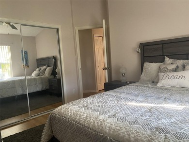 Outstanding one-story home with a screened porch and a beautiful on Plantation Golf Club in Florida - for sale on GolfHomes.com, golf home, golf lot