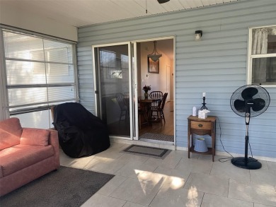 Outstanding one-story home with a screened porch and a beautiful on Plantation Golf Club in Florida - for sale on GolfHomes.com, golf home, golf lot