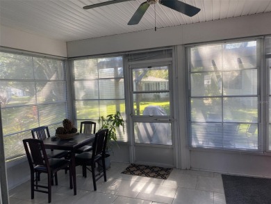 Outstanding one-story home with a screened porch and a beautiful on Plantation Golf Club in Florida - for sale on GolfHomes.com, golf home, golf lot