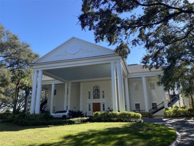 Outstanding one-story home with a screened porch and a beautiful on Plantation Golf Club in Florida - for sale on GolfHomes.com, golf home, golf lot