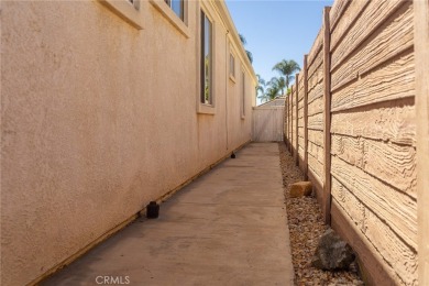 Welcome to your new sanctuary in Menifee Lakes! This beautifully on Menifee Lakes Country Club - Lakes in California - for sale on GolfHomes.com, golf home, golf lot