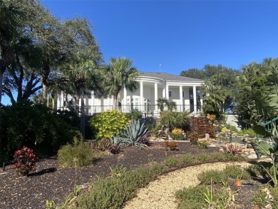Outstanding one-story home with a screened porch and a beautiful on Plantation Golf Club in Florida - for sale on GolfHomes.com, golf home, golf lot