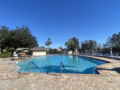 Outstanding one-story home with a screened porch and a beautiful on Plantation Golf Club in Florida - for sale on GolfHomes.com, golf home, golf lot