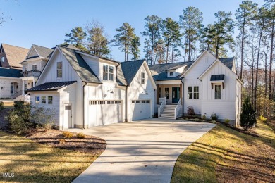 This modern farmhouse is a dream for anyone who loves both style on The Preserve At Jordan Lake Golf Club in North Carolina - for sale on GolfHomes.com, golf home, golf lot