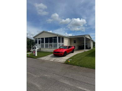 How would you like a view of the water from your front porch on Golden Lakes Golf Course in Florida - for sale on GolfHomes.com, golf home, golf lot
