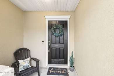 Enjoy low-maintenance living in this two-story townhome located on Golf Club At Fleming Island in Florida - for sale on GolfHomes.com, golf home, golf lot