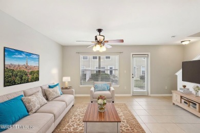 Enjoy low-maintenance living in this two-story townhome located on Golf Club At Fleming Island in Florida - for sale on GolfHomes.com, golf home, golf lot