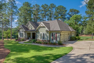 Architect's personal custom home at Reynolds Lake Oconee nestled on Reynolds Lake Oconee - The Landing in Georgia - for sale on GolfHomes.com, golf home, golf lot