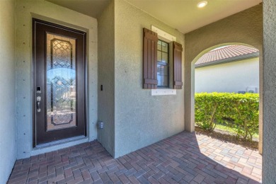 Panoramic lake views in a premier Venice golf community! on Sarasota National Golf Club in Florida - for sale on GolfHomes.com, golf home, golf lot