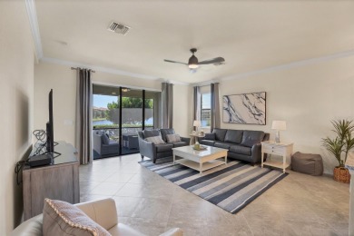 Panoramic lake views in a premier Venice golf community! on Sarasota National Golf Club in Florida - for sale on GolfHomes.com, golf home, golf lot