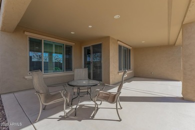 Set within a vibrant resort-style community, this exceptional on Poston Butte Golf Club in Arizona - for sale on GolfHomes.com, golf home, golf lot