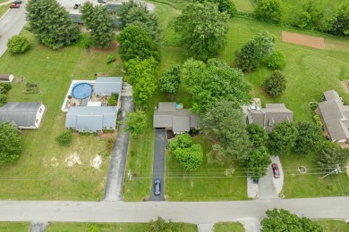 Charming home nestled in Hidden Valley. Only a few steps away on Hidden Valley Golf and Country Club in Tennessee - for sale on GolfHomes.com, golf home, golf lot