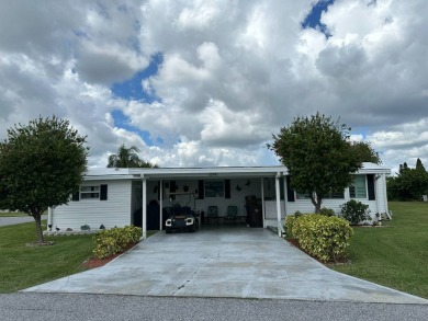 Lot 234 is a beautifully landscaped corner lot located in on Anglers Green Golf Course in Florida - for sale on GolfHomes.com, golf home, golf lot