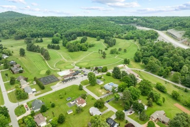 Charming home nestled in Hidden Valley. Only a few steps away on Hidden Valley Golf and Country Club in Tennessee - for sale on GolfHomes.com, golf home, golf lot