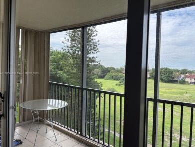 BEAUTIFUL 2/2 CONDO - ENCLOSED AND SCREENED BALCONY WITH VIEW ON on  in Florida - for sale on GolfHomes.com, golf home, golf lot