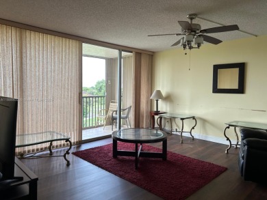 BEAUTIFUL 2/2 CONDO - ENCLOSED AND SCREENED BALCONY WITH VIEW ON on  in Florida - for sale on GolfHomes.com, golf home, golf lot