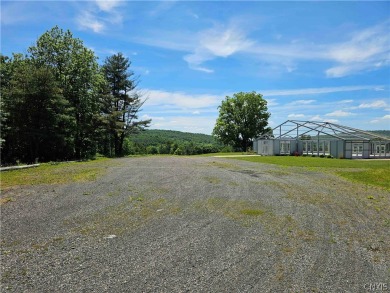 This 18 hole golf course with 318 acres is located in Candor NY on Catatonk Golf Club, Inc. in New York - for sale on GolfHomes.com, golf home, golf lot